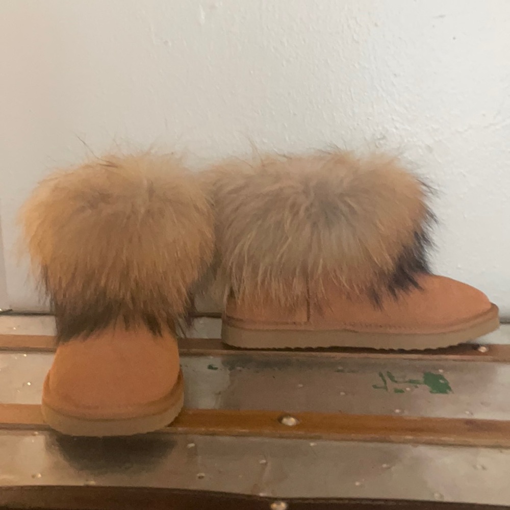 Ugg boots. Short with real fox fur trim. Never worn